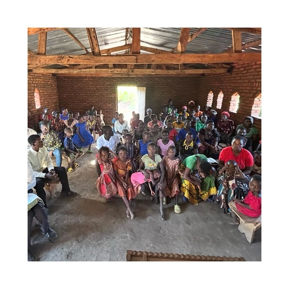 Congregation celebrating new Bibles