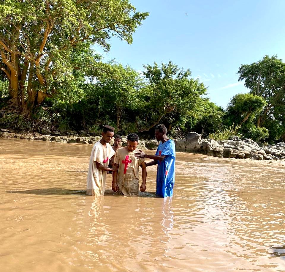 Woman receiving her first Bible