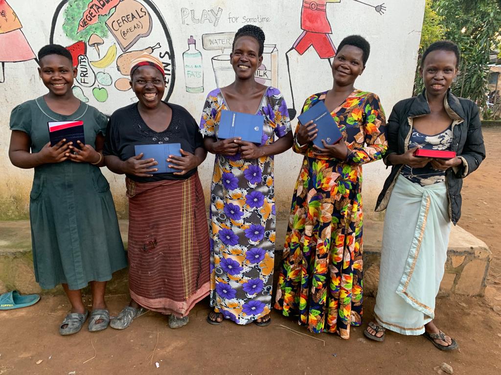 Pastor teaching from new Bible